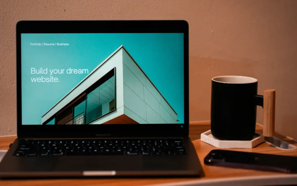 Beginner working on a WordPress website using Elementor page builder in a modern workspace.